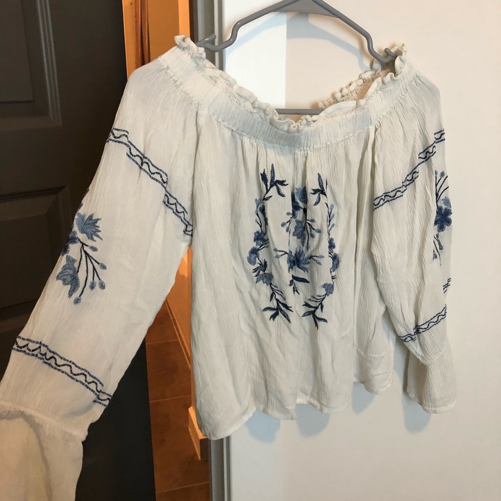 White blouse blue detail